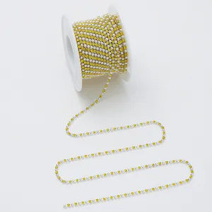 Detailed view of rhinestone pearl chain, perfect for DIY clothing, bags, and phone case decoration.