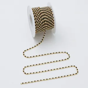 Roll of pearl rhinestone claw chain for DIY garments, bags, and phone case accessories.