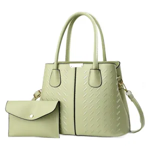 Groene geweven handtas set met shopper schoudertas en bijpassende clutch voor dames.