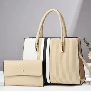 Elegante dames handtas met kleurblok design en bijpassende clutch voor stijlvol dagelijks gebruik.