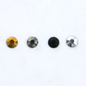 Flatback resin rhinestones close-up, multi-faceted sparkle beads for DIY clothing crafts.