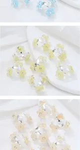 Detail shot of alloy flower bead caps with rhinestones, DIY handmade jewelry accessories.
