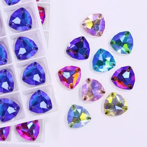 Rhinestones close-up, fat triangle AB crystal glass flatback sew-on stones for DIY apparel crafts.