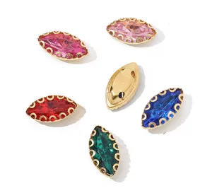 DIY navette rhinestones with gold claw settings, colorful sew-on crystals for garments.