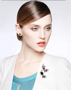 Elegant crystal bird brooch and matching earrings set, premium rhinestone fashion jewelry for women.
