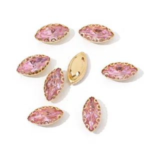 Pink marquise sew-on rhinestones with gold claw setting for DIY crystal apparel accessories.