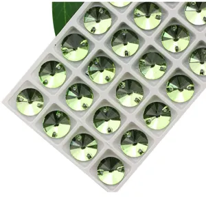 Light green round glass sew-on rhinestones with dual holes for garment DIY crafts.