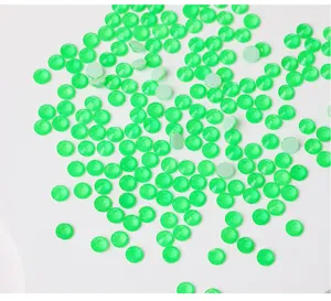Green flatback rhinestones detail shot, sparkling crystals for DIY craft decoration