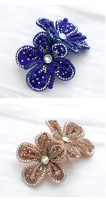Detailed shot of sparkling rhinestone flower shoe clips, elegant double layer crystal DIY accessories.