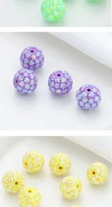 Colorful iridescent rhinestone round loose spacer beads with center hole for DIY jewelry making.