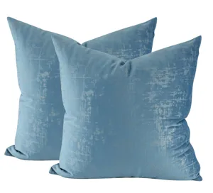 Blue plush throw pillow cover with abstract distressed geometric texture for modern home decor.