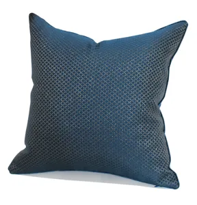 Blue grid square cushion cover close-up detail showcasing fine texture and elegant design.