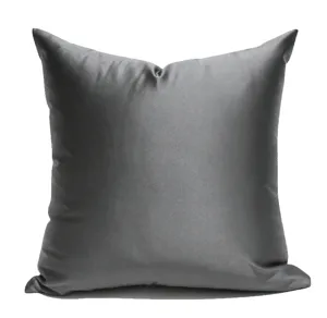 Detailed view of the solid dark grey square throw pillow cover, showing smooth glossy fabric.