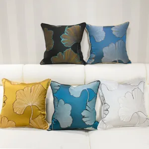 Modern minimalist square throw pillow covers with elegant ginkgo leaf embroidery design.