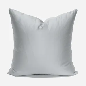 Silver grey throw pillow for sofa chair, modern cushion cover with smooth fabric surface.