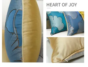 Luxury blue and gold ginkgo leaf cushion cover with elegant zipper and piping design.
