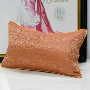 Modern luxury orange textured throw pillow for sofa, bedroom, and hotel decoration.