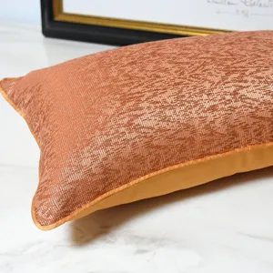 Modern luxury orange abstract pattern lumbar throw pillow for sofa and bedroom decor.