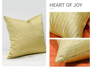 Golden sofa square throw pillow with geometric jacquard pattern for hotel and home decor.