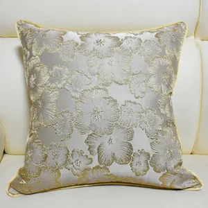Luxury new Chinese style sofa throw pillow cover with golden floral jacquard and yellow piping.
