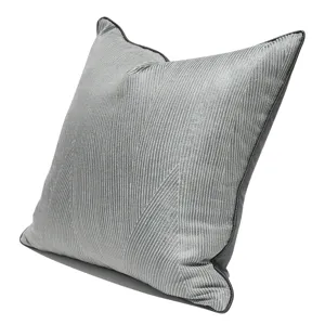 Federa per cuscino grigio blu dettaglio primo piano trama motivo geometrico cuscino.