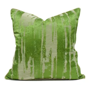 Abstract green throw pillow cover detail, luxury decorative cushion for sofa and bed.