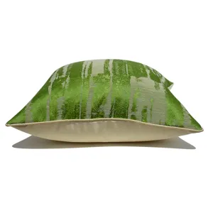 Luxury abstract throw pillow cover for sofa and bed, detailed close-up of green pattern texture.