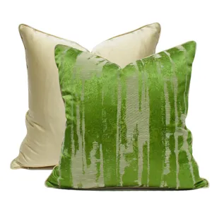 Luxury abstract green decorative pillow cover and solid cream cushion for modern sofa decor.