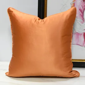 Modern orange square throw pillow cover for sofa bed, soft satin fabric Nordic home decor cushion.