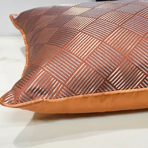 Modern luxury geometric throw pillow cover, elegant orange and silver decorative cushion.