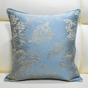 Details of the Chinese style jacquard throw pillow cover with elegant blue and gold wave pattern.