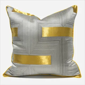 Luxury grey and gold geometric throw pillow cover for modern living room sofa decor.
