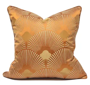 Modern orange fan geometric pattern square pillow cover detail view with gold weave texture.