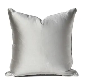 Detailed close-up of a smooth silver satin pillow cover showcasing the elegant glossy fabric texture.