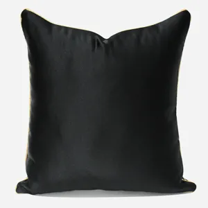 Black luxury square throw pillow case with golden piping, modern sofa chair cushion cover view