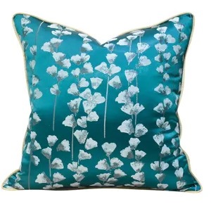 Housse de coussin décorative à fleurs bleu-vert pour canapé de salon et lit.