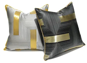 Modern geometric throw pillow cover detail with gold piping, elegant home decor accent.