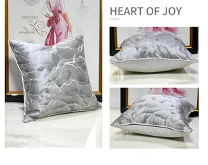 Modern luxury light grey throw pillow detail view, comfortable cushion for living room sofa.