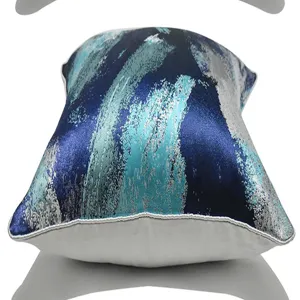 Blue grey abstract throw pillow cover detail view with elegant silver piping design