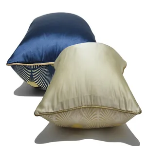 Close-up of decorative pillowcase with elegant fan-shaped art deco pattern in soft satin fabric.