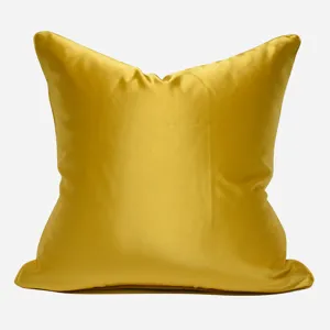 Yellow modern minimalist satin pillow cover for luxury sofa living room and hotel bedroom decor.