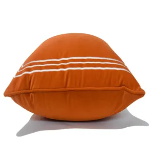 Housse de coussin décorative orange avec bandes brodées blanches pour canapé chambre