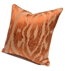 Orange wavy throw pillow cover fabric detail, soft texture luxury home decor cushion.