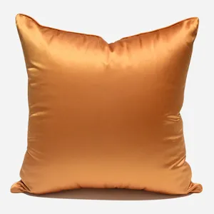 Luxury orange satin square throw pillow cover for modern sofa and bedroom decor home.