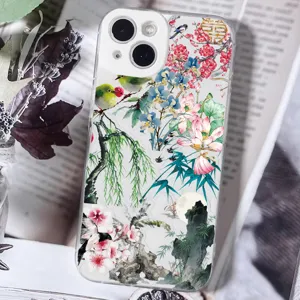Clear transparent phone case featuring elegant traditional Chinese ink painting floral and bird art.