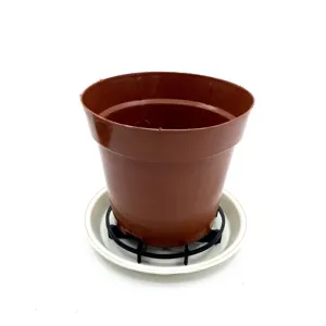 Plastic flower pot drainage stand and tray detail view, breathable plant pot riser base.