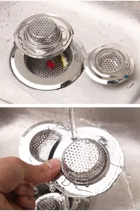Stainless steel sink strainer detail showing efficient drainage and mesh filter design.