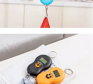 Portable electronic hanging scale with digital display, compact luggage weighing scale.