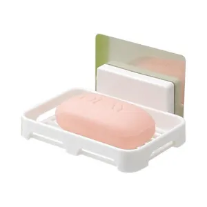 Wall-mounted soap dish with drainage and adhesive backing, plastic bathroom soap holder tray.