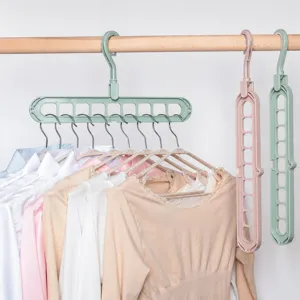 Multifunctionele 9-gats magische kledinghanger ruimtebesparende plastic garderobe organizer